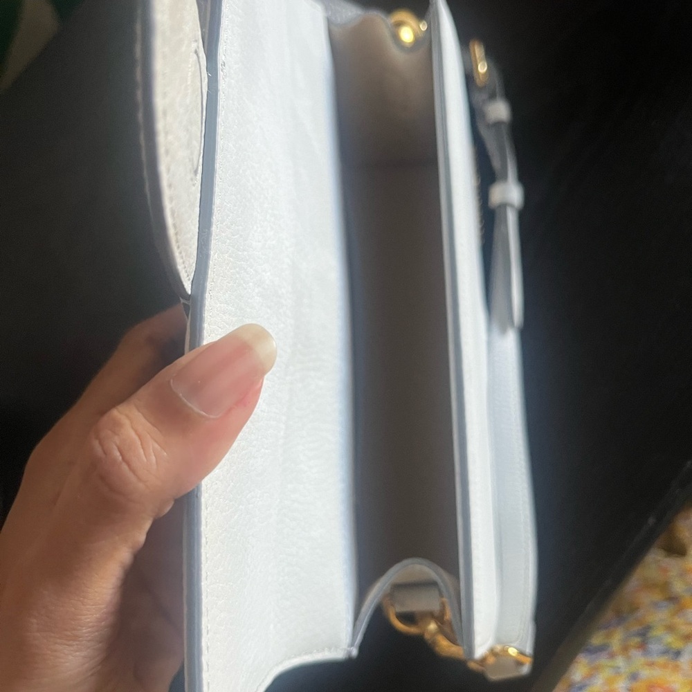 Jacquemus Le Grand Bambino purse in light grey.